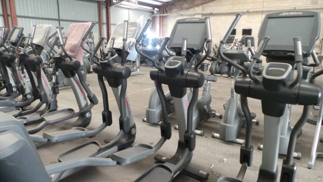 row of Life Fitness Engage 95x Elliptical Cross Trainer 15" LCD Touch Screen