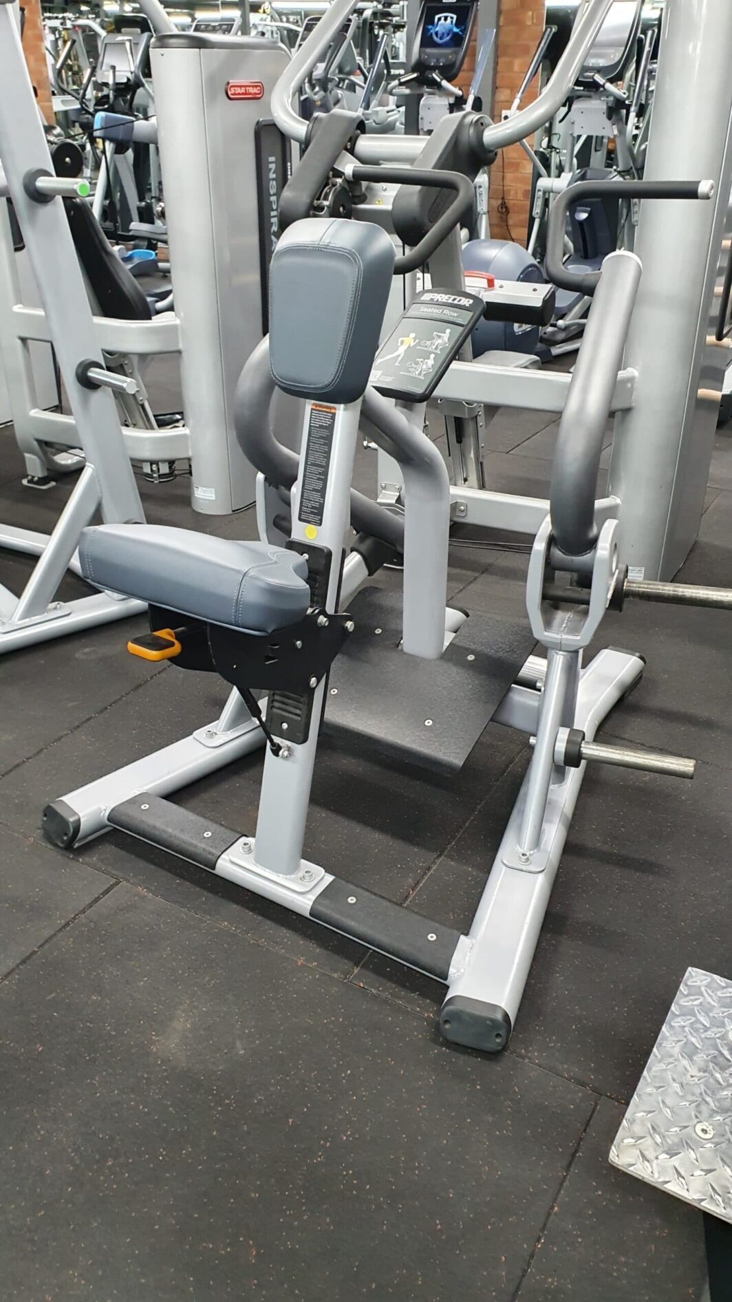 Precor Discovery Plated Loaded Seated Row gym equipment