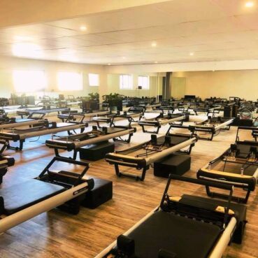 multiple rows of pilates machines