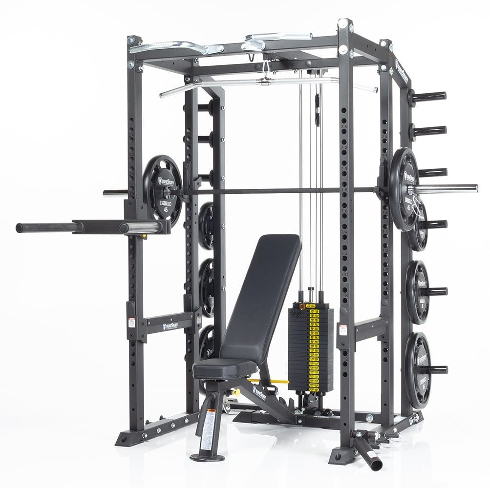TuffStuff CALGYM Power Rack fitted with pin loaded attachment, safety bars, barbell and adjustable bench