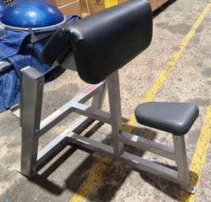 Star Trac Seated Preacher Curl used gym equipment